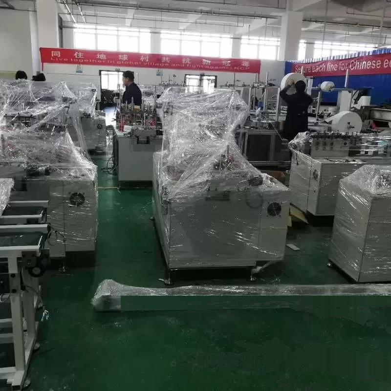 半自动n95口罩机_全自动生产一拖二口罩机专注生产口罩机打半自动n95口罩机